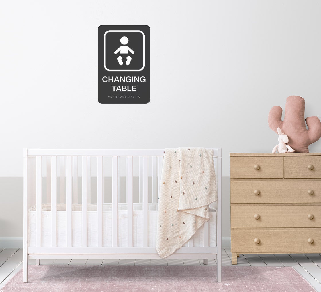 Baby Wearing Diaper Braille Sign