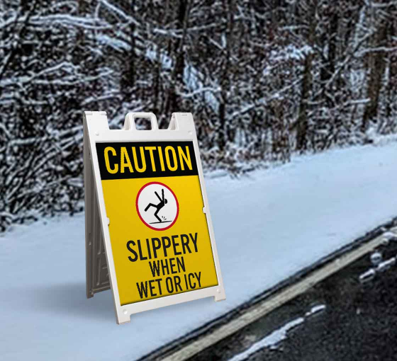 caution slippery road sign