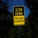 Slow Down This Is Our Neighborhood Aluminum Sign (EGR Reflective)