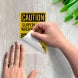 Bilingual OSHA Caution Slippery When Wet Decal (EGR Reflective)