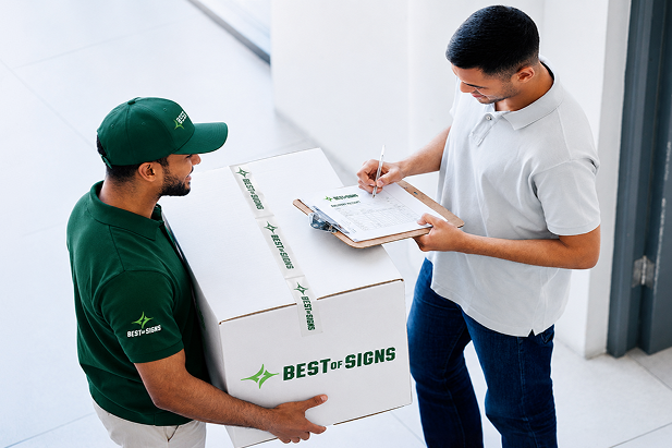 Best of Signs team member delivering an order to a customer